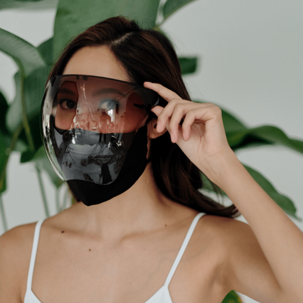 Our reusable face shield consists of an environmentally friendly polycarbonate lens which is durable, withstanding drops and bumps. The protective area covers a user from the eyebrows to the chin. The face shield comprises of an anti-fog coating for clear visibility. The spectacle design eliminates discomfort around the ear area. The face shield can be sterilized at 120°C. The one-piece nose bridge design is very comfortable to wear eliminating discomfort. Care instruction - wipe the surface of the face shield with an alcohol-based disinfectant and air dry. The raised nasal attachment gives ample space between the nose and face, allowing a user to wear their prescription glasses or sunglasses. Available Colours: Red, Purple, Black, Blue & Brown What's in the Box? 1 x Face Shield - Protective Glasses (Coloured)